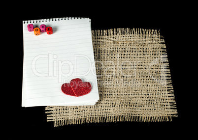 red hearts and white paper sheet