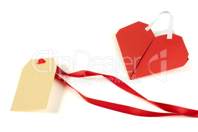 heart made ??of curled red paper and label