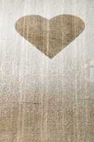 heart pattern on an old wooden board