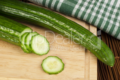 sliced ??cucumber on a wooden board