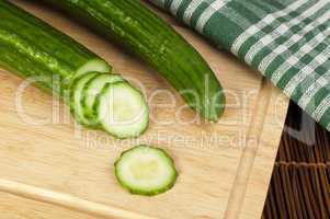 sliced ??cucumber on a wooden board