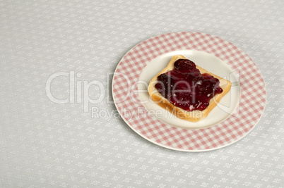 spread jam on bread