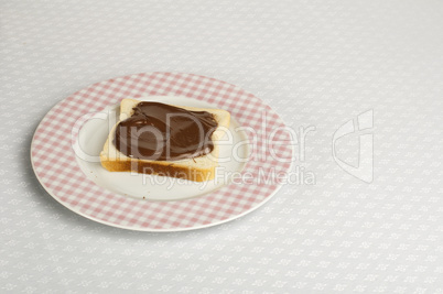 liquid chocolate on a slice of bread