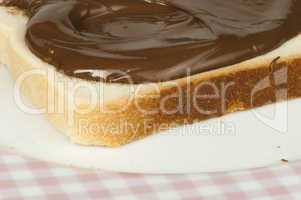 liquid chocolate on a slice of bread