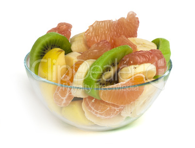 fruit salad with citrus in a glass bowl