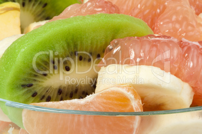 fruit salad with citrus in a glass bowl