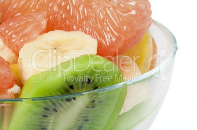 fruit salad with citrus in a glass bowl