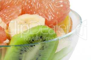 fruit salad with citrus in a glass bowl