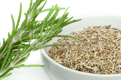 fresh rosemary and a bowl with dried