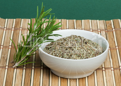 fresh rosemary and a bowl with dried