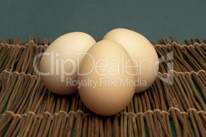 raw eggs on wooden base