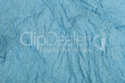 crumpled blue paper