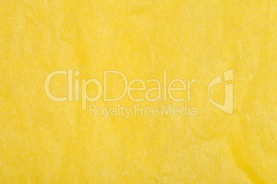 crumpled yellow paper