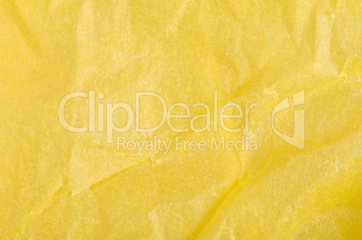 crumpled yellow paper