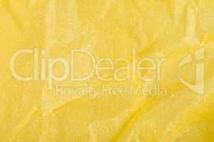 crumpled yellow paper