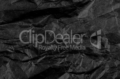 crumpled black paper