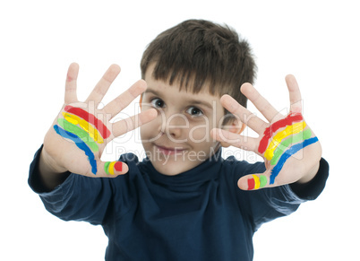 boy hands painted with colorful paint