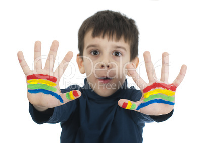 boy hands painted with colorful paint