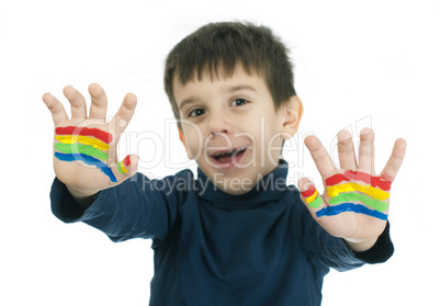 boy hands painted with colorful paint