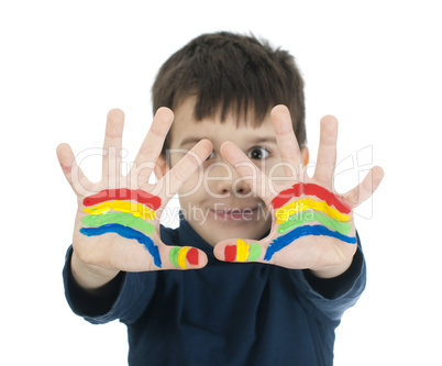 boy hands painted with colorful paint