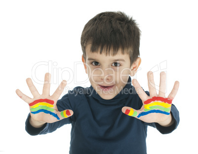 boy hands painted with colorful paint