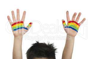 boy hands painted with colorful paint