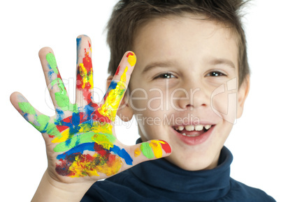 boy hands painted with colorful paint