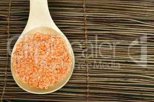 lentil split in wooden spoon