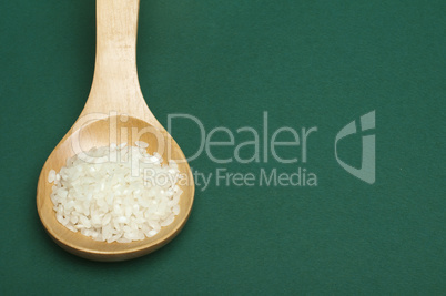 rice baldo in wooden spoon