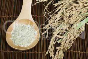 basmati rice in wooden spoon