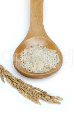 basmati rice in wooden spoon