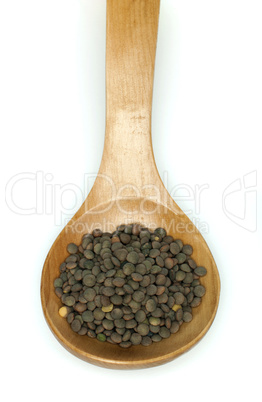 lentil in wooden spoon