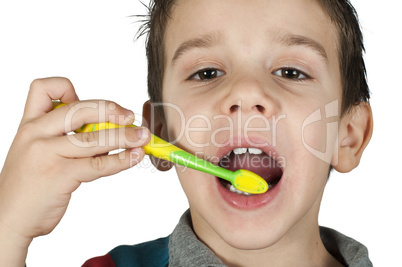 boy brushing his teeth