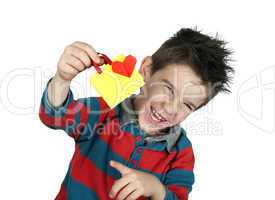 boy who laughs and holds shopping bag with heart.