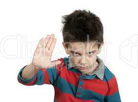 little boy showing stop with his hand