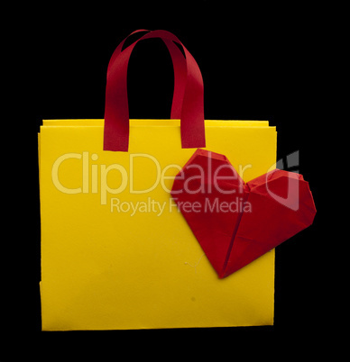 yellow shopping bag with red heart