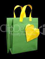 green shopping bag with heart.