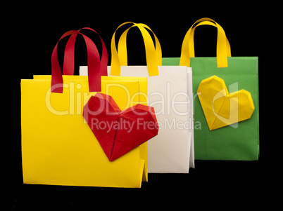 shopping bags with heart. isolated origami