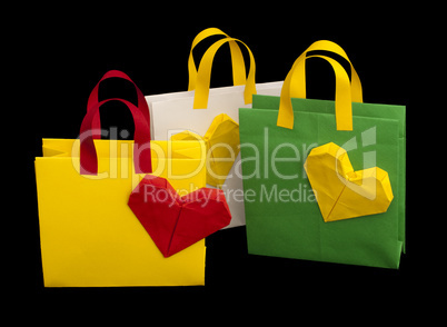 shopping bags with heart. isolated origami