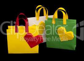 shopping bags with heart. isolated origami