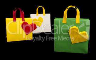 shopping bags with heart. isolated origami