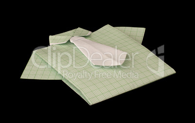 isolated paper made green plaid shirt.
