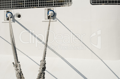 ship ropes and moored ship