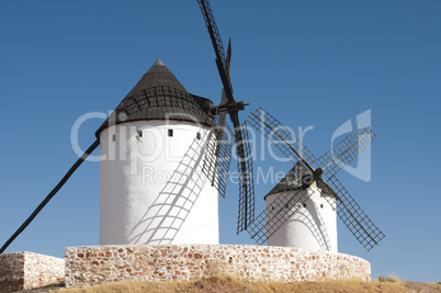 white ancient windmills