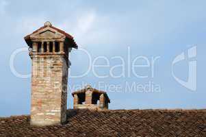 chimney on the roof of the old church