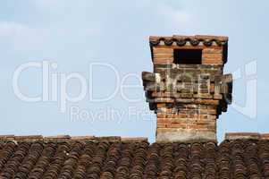 chimney on the roof of the old church