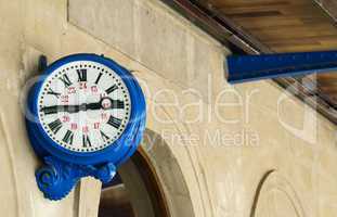 antique external clock on  railway station