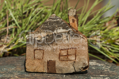 model of a small wooden house