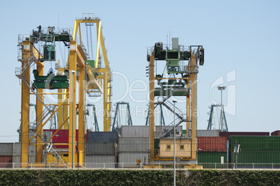 working crane bridge in shipyard at dusk for logistic import exp