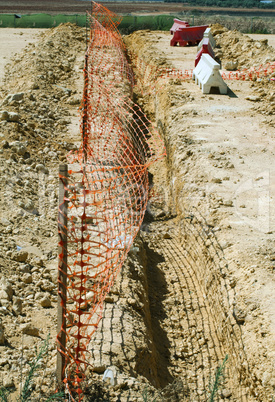 excavated channel for tube